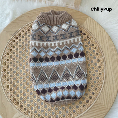 Patterned dog sweater on a wooden surface with 'ChillyPup' branding.